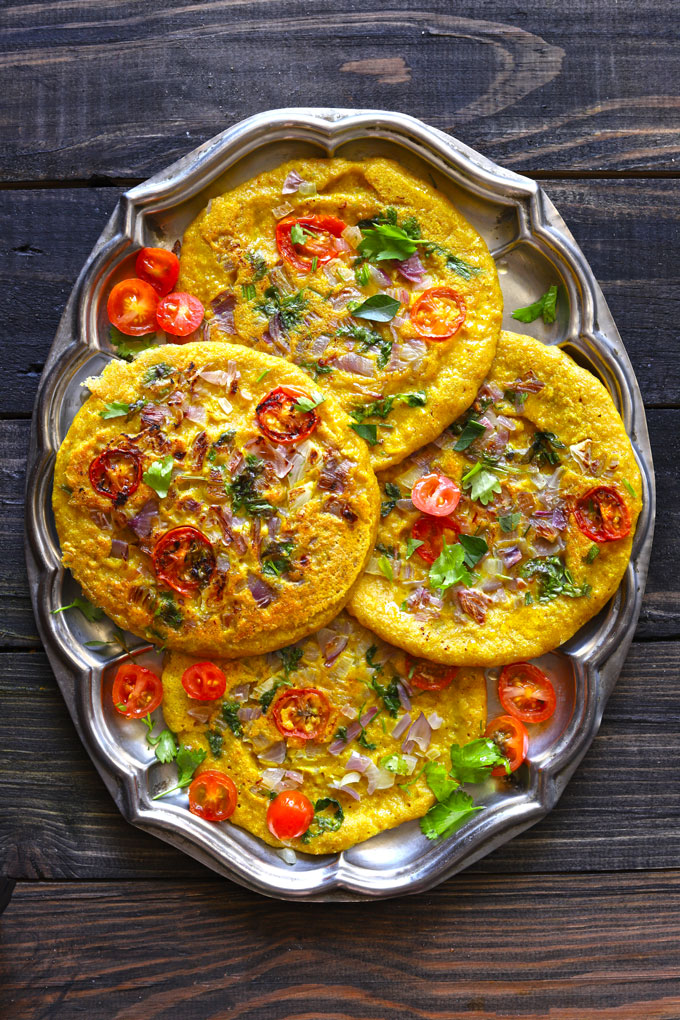 aerial shot of moong dal chilla in a platter