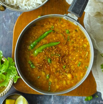 aerial shot of panchmel dal in a aluminium saucepan