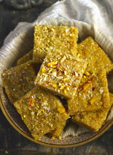 aerial shot of panjiri in a brass serving platter