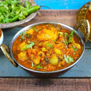 side close up shot of aloo ki sabzi in a kadhai