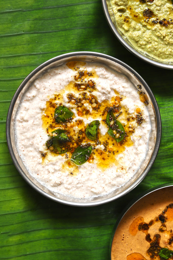 aerial shot of coconut chutney in a steel serving bowl