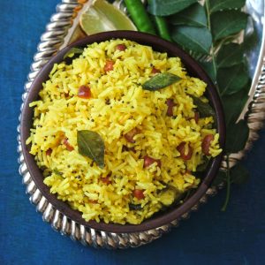 aerial shot of lemon rice in a dark brown bowl