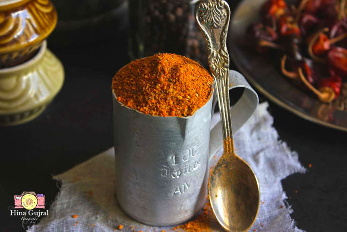 side close up shot of homemade rasam podi in a small cup