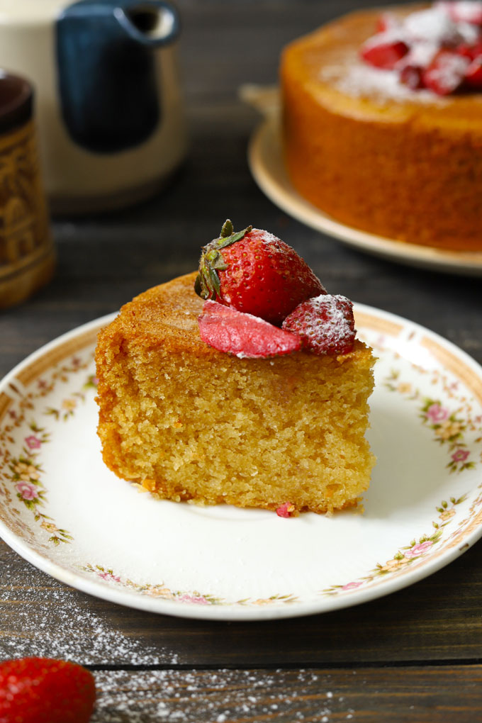 slice of vanilla sponge cake on a white plate