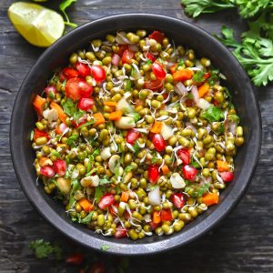 aerial shot of sprouts salad in a black serving bowl