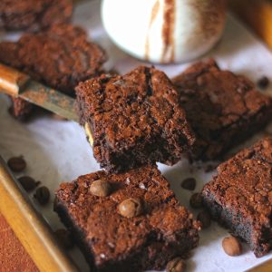 side close up shot of chocolate brownie stacked in a platter