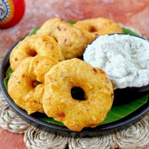 side close up shot of medu vada on a platter