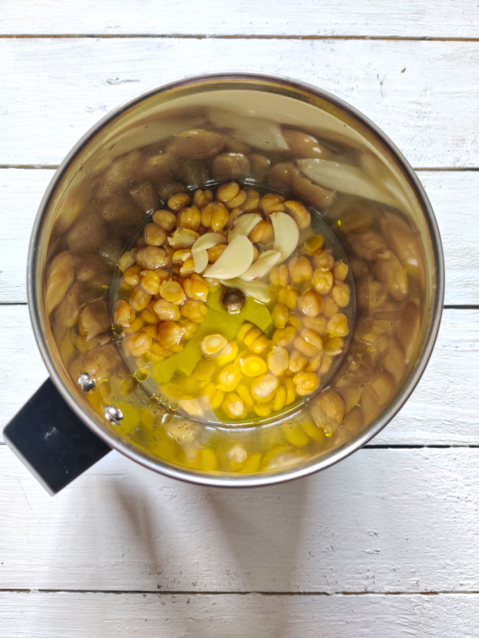 aerial shot of hummus ingredients in a blender