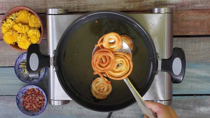 aerial shot of frying jalebi