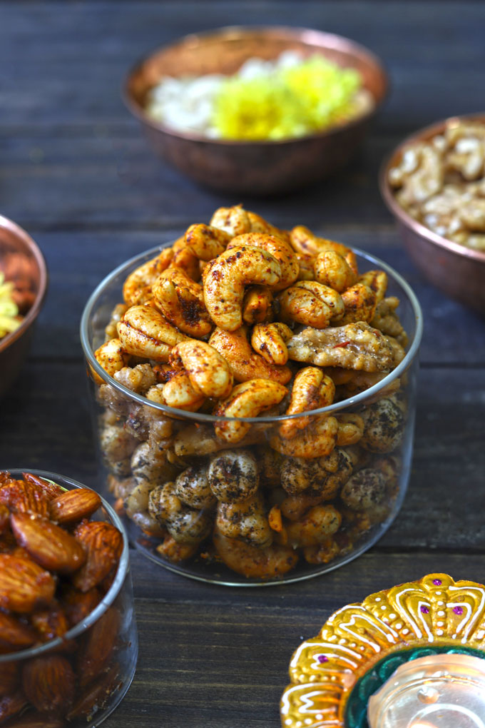 side shot of roasted nuts in a glass container