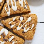 aerial shot of chocolate chip scone on a white surface