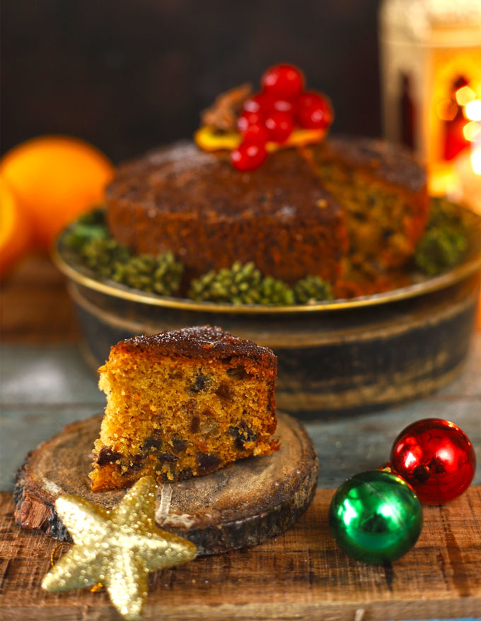 side shot of slice of a plum cake