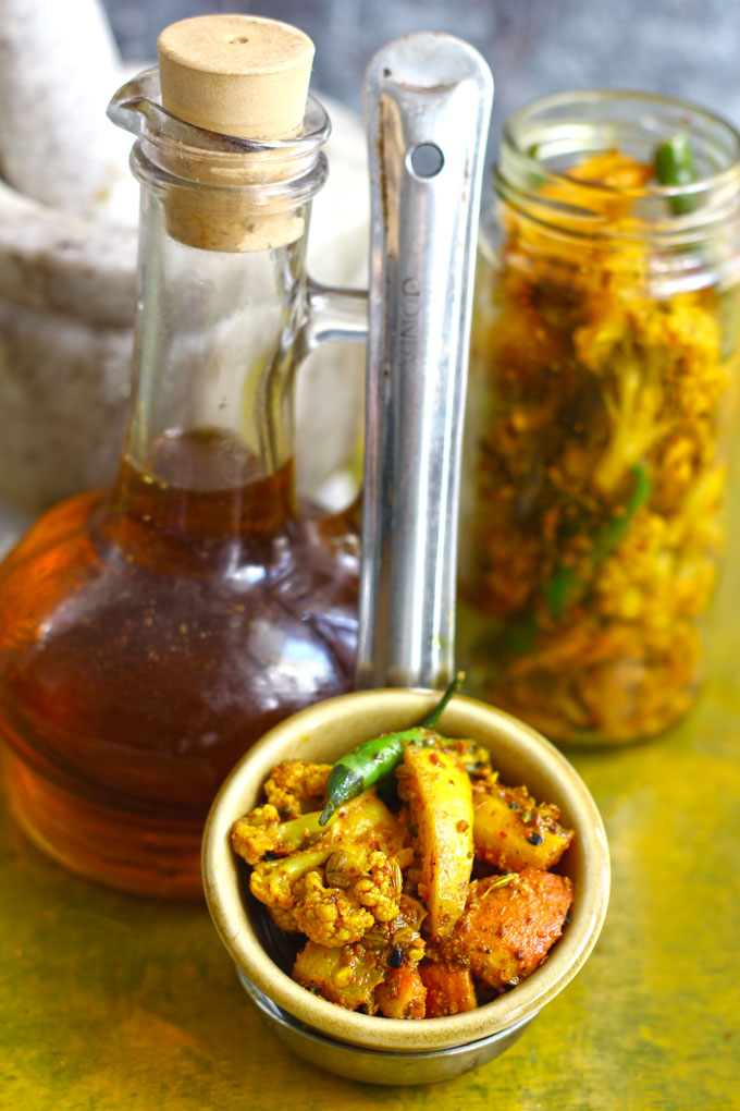 side shot of gobi gajar ka achaar in a ceramic bowl