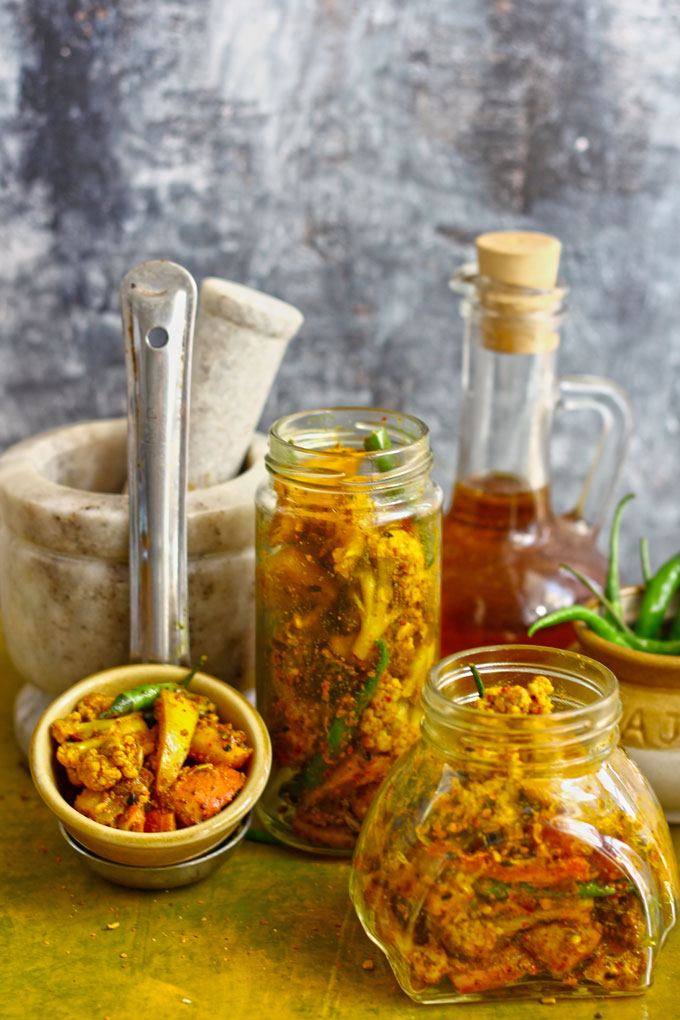 side shot of Punjabi gobi gajar achar in glass jars