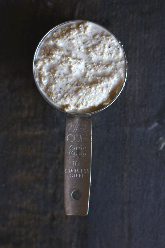 aerial shot of white poppy seeds and almond paste