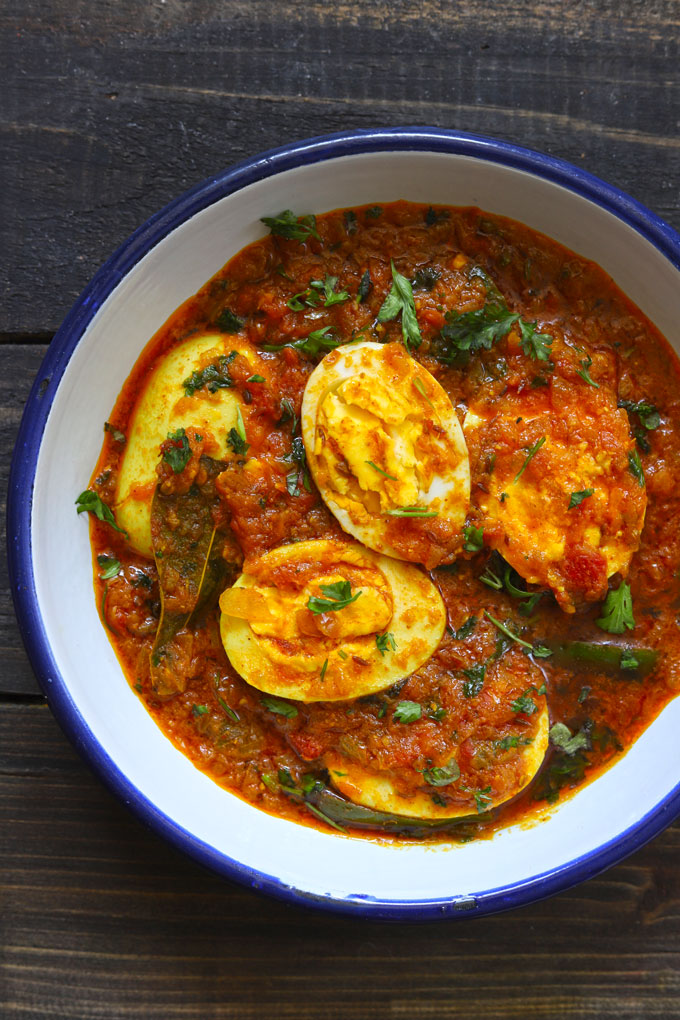 aerial shot of egg curry in a white plate