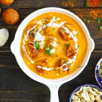 aerial shot of paneer kofta served on a white pan