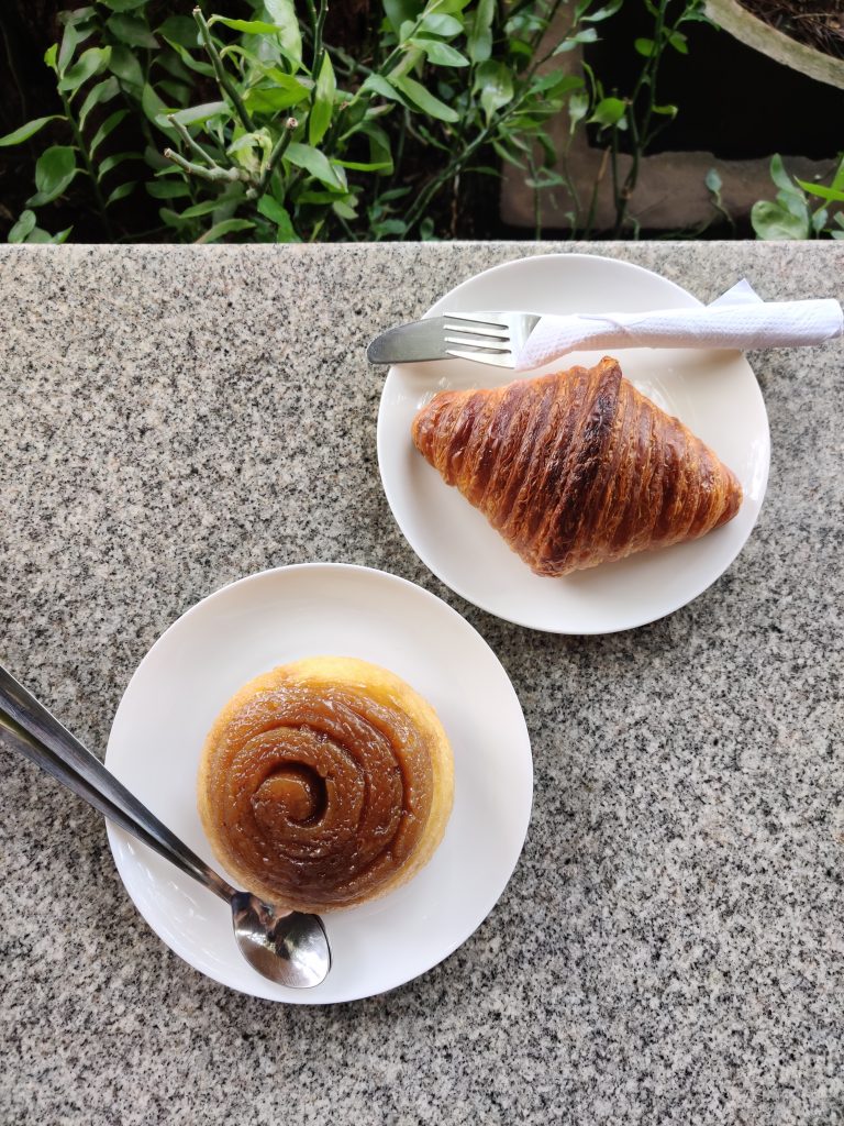 Cinnamon Roll and Croissant at Bread and Chocolate, Auroville