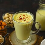 side close up shot of badam milk in a glass mug