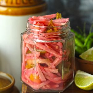side shot of ginger pickle in a glass jar