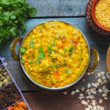 aerial shot of oats khichdi in a serving bowl