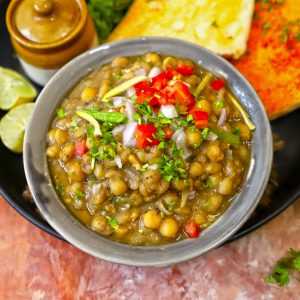 aerial shot of matar in a black ceramic bowl