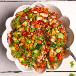 aerial shot of kachumber salad in a white ceramic bowl