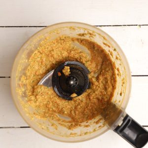 making roasted red pepper dip in a food processor
