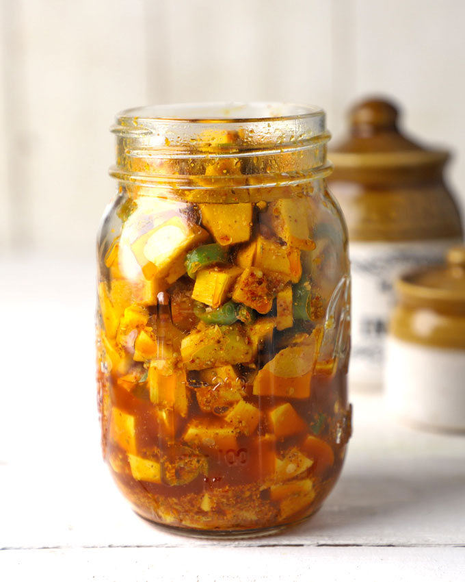 side shot of instant mango pickle in a mason jar