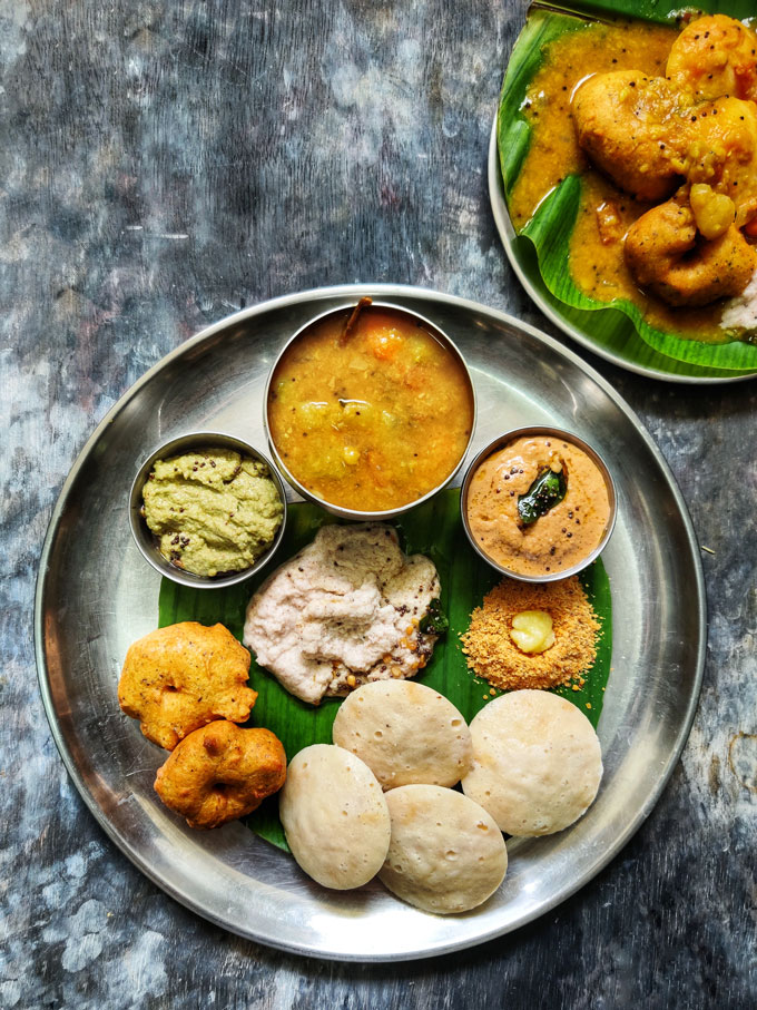aerial shot of Indian thali on a black surface