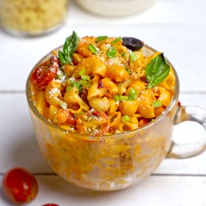 side shot of microwave pasta in a glass mug