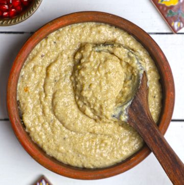 aerial shot of badam phirni in an earthen bowl