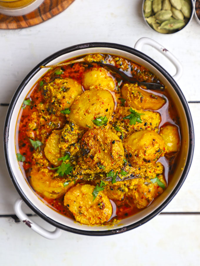 aerial shot of potato curry in a white ceramic bowl