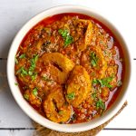 aerial shot of soya chaap masala in a white ceramic bowl