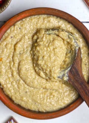 aerial shot of badam phirni in an earthen bowl