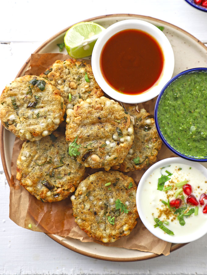 aerial shot of sabudana cutlet on a platter with the chutney