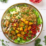 aerial shot of pumpkin salad on a white ceramic platter