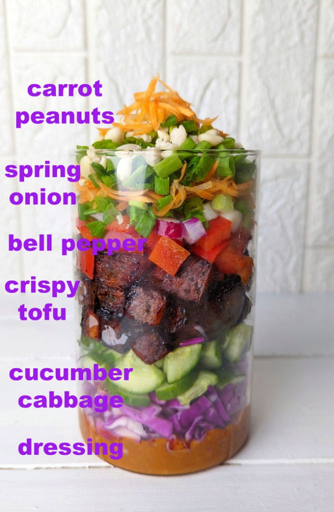 side shot of crispy tofu salad jar