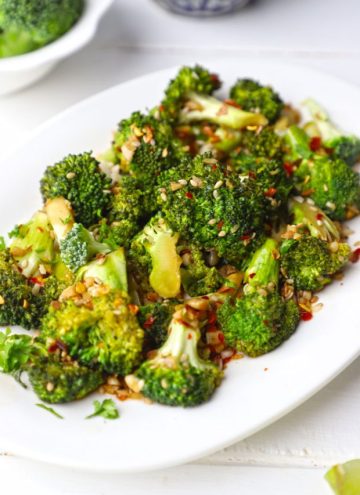 side shot of stir fried broccoli on a platter