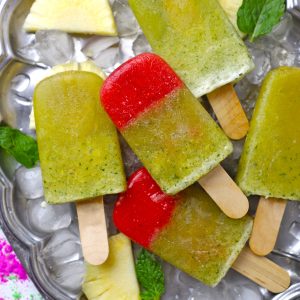 aerial shot of pineapple popsicles on a platter