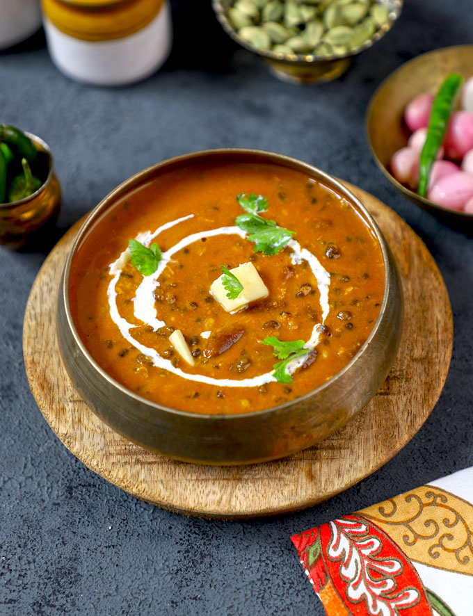 side top shot of dal makhani in a traditional Indian bowl