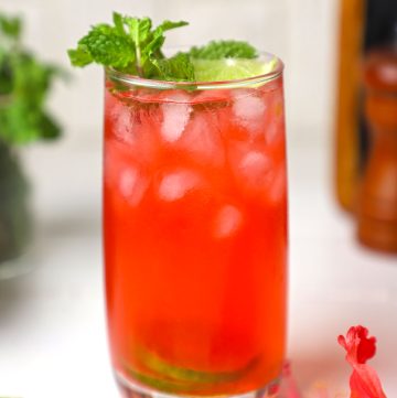 side shot of iced hibiscus tea served in a glass