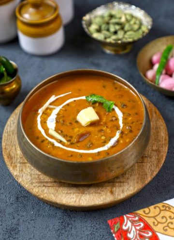 side top shot of dal makhani in a traditional Indian bowl