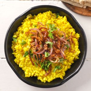 aerial shot of sookhi urad dal in a black platter