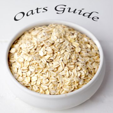 side shot of rolled oats in a white ceramic bowl