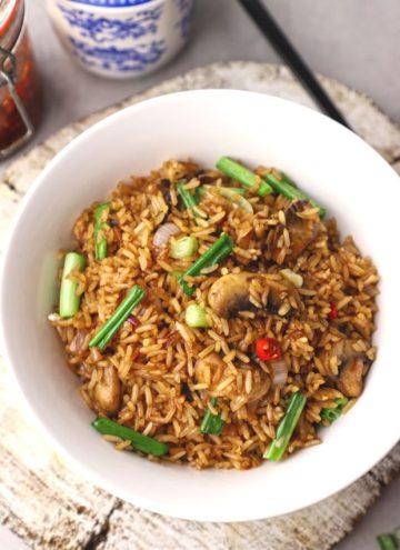 aerial shot of fried rice in a white ceramic bowl