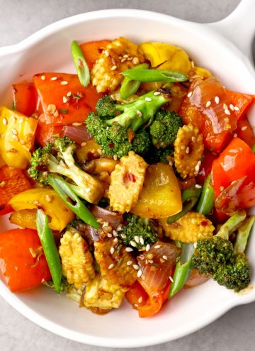 aerial shot of vegetable stir fry in a white pan