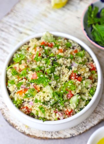 aerial shot of couscous salad in a white ceramic bowl