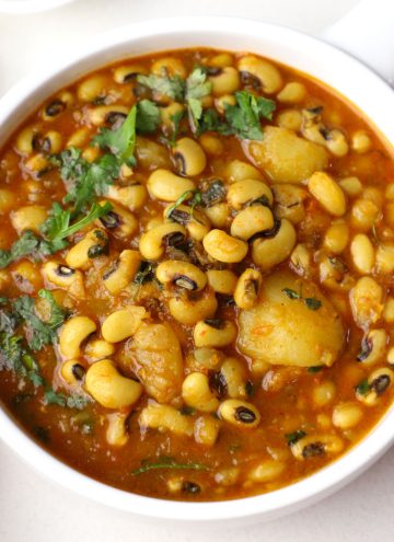 aerial shot of Punjabi lobia masala in a white ceramic bowl