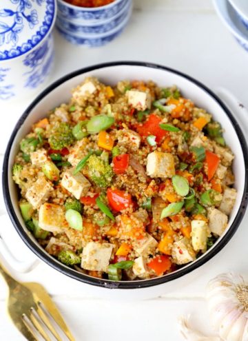 aerial shot of quinoa fried rice in a white ceramic bowl